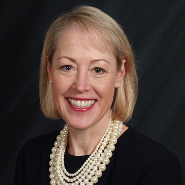 A professional headshot of Sarah Gunhouse